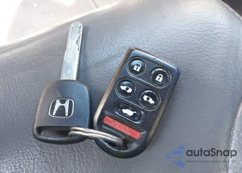 2010 Honda Odyssey Ex-L z USA, uszkodzony, nr VIN 5FNRL3H75AB025562